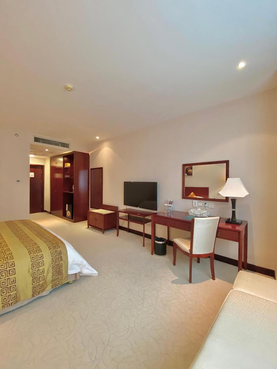 โรงแรม เบจิง พาเลซ โซลักซ์ แอสทานา อัสตานา ภายนอก รูปภาพ A room at the hotel